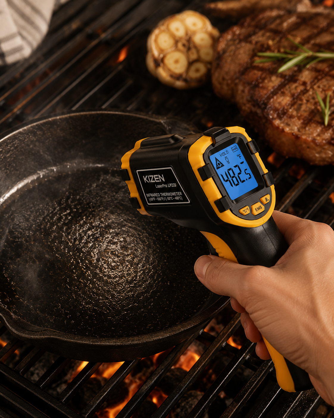 KIZEN infrared thermometer gun checking a hot pan on a grill
